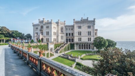 View of Miramare Castle with ocean behind.